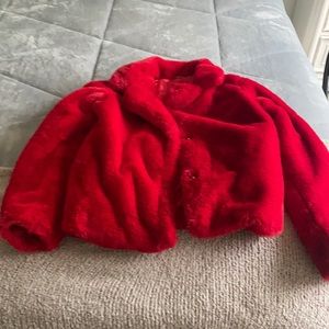 Never warn red faux fur, shiny and soft.